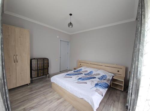 Postel nebo postele na pokoji v ubytování Guest House Tekla