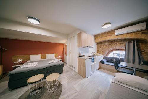 Ένα ή περισσότερα κρεβάτια σε δωμάτιο στο Chios City Inn