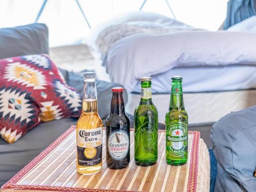 three bottles of beer on a tray on a table at Lupo Forest "GRAN FOREST Echizen Miyama" - Vacation STAY 07137v in Fukui