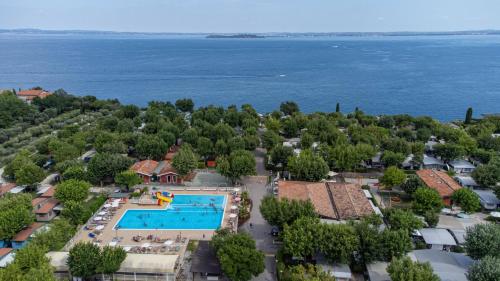an aerial view of a resort with a swimming pool at Sereno Camping Holiday in Moniga
