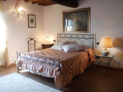 Postel nebo postele na pokoji v ubytování La Pieve Di Sant'Andrea