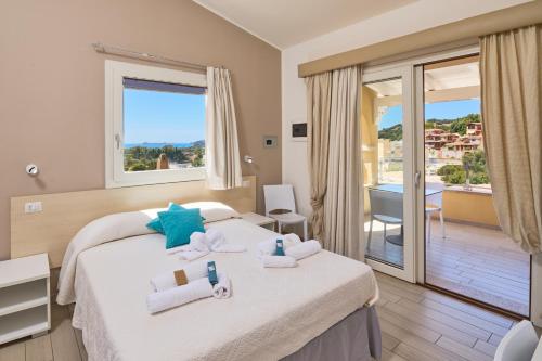 Postel nebo postele na pokoji v ubytování B&B Simius Bay