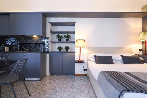 Ένα ή περισσότερα κρεβάτια σε δωμάτιο στο Duomo Terrace Suite