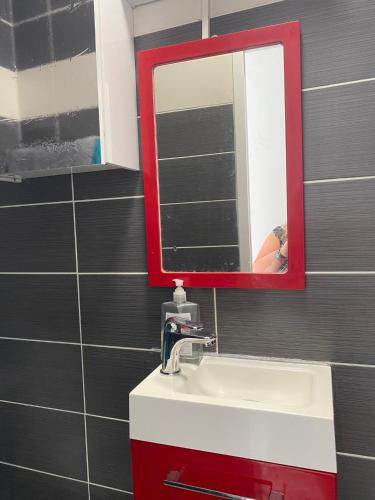 Et badeværelse på Appartement - Villa Muguet