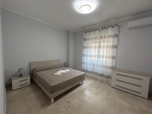 Katil atau katil-katil dalam bilik di Ludox Apartments