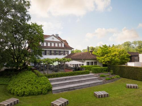 a view of the house from the garden at b-smart hotel Widnau in Widnau