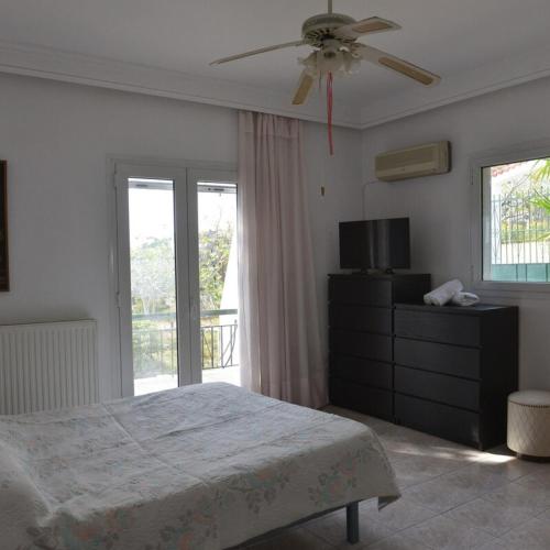 Katil atau katil-katil dalam bilik di Salamis Beachfront House