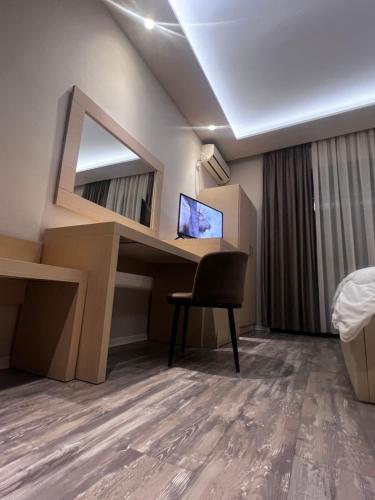 TV a/nebo společenská místnost v ubytování Hotel Lungomare