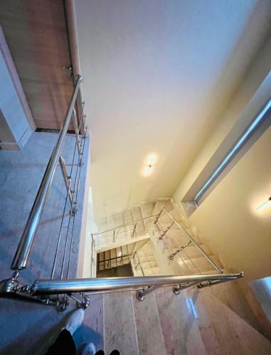 an overhead view of a stairwell in a building at Villa Ultra VIP in Sheikh Zayed