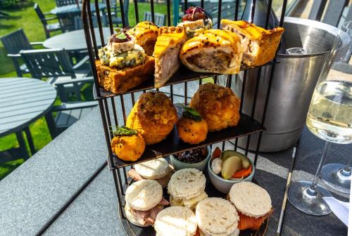 a rack of different types of bread and pastries at Hotel Victoria in Whitby