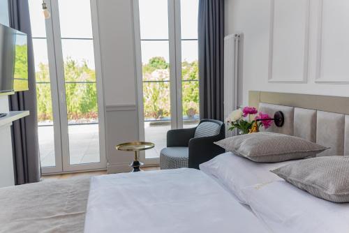 Ένα ή περισσότερα κρεβάτια σε δωμάτιο στο Apartamenty Stare Miasto