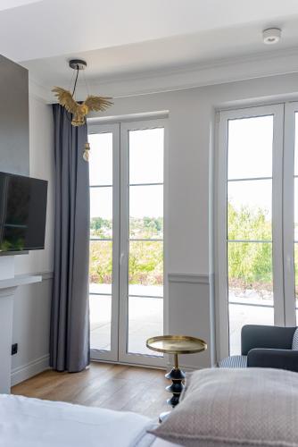 Ένα ή περισσότερα κρεβάτια σε δωμάτιο στο Apartamenty Stare Miasto