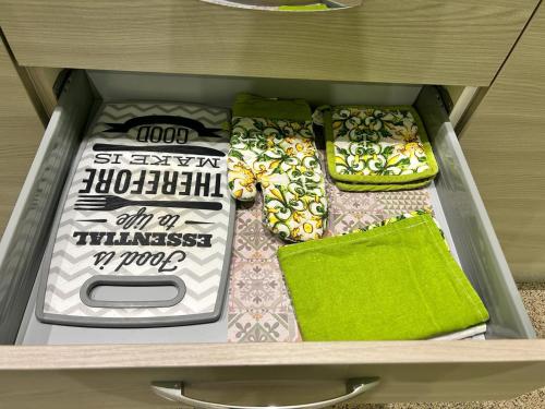 a drawer with a birthday cake in it at Acqua Marina apartment in Acquaviva delle Fonti