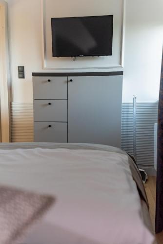 Ένα ή περισσότερα κρεβάτια σε δωμάτιο στο Apartamenty Stare Miasto