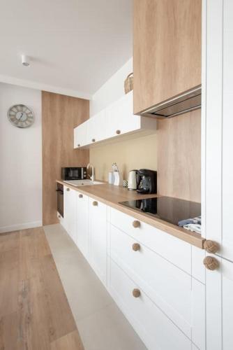Dapur atau dapur kecil di Apartament Bryza Mechelinki