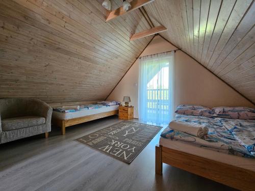 מיטה או מיטות בחדר ב-Domek U Kasi - Idealny dla CIEBIE !!!!