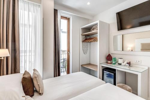 Postel nebo postele na pokoji v ubytování Hotel Sorrento City