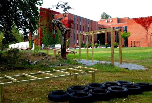 Un jardín fuera de Skogshem & Wijk