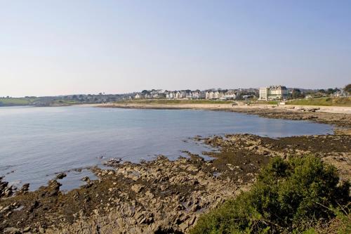 a view of a beach with buildings in the background at The Falmouth Hotel in Falmouth