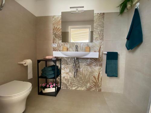 Et badeværelse på Casa vacanza *Villa Marchesina*