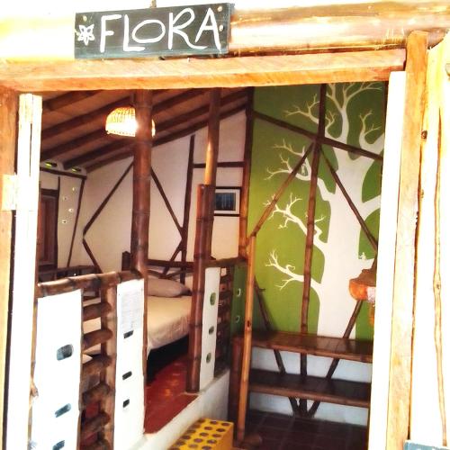 a room with a bunk bed in a room at Hotel La Casa de Francois in San Agustín