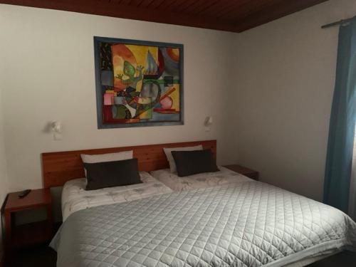 Postel nebo postele na pokoji v ubytování Linnamehe Holiday Centre