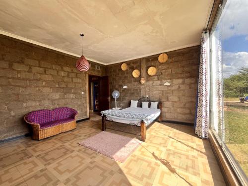 Gallery image of Amboseli Glass house in Oloitokitok 
