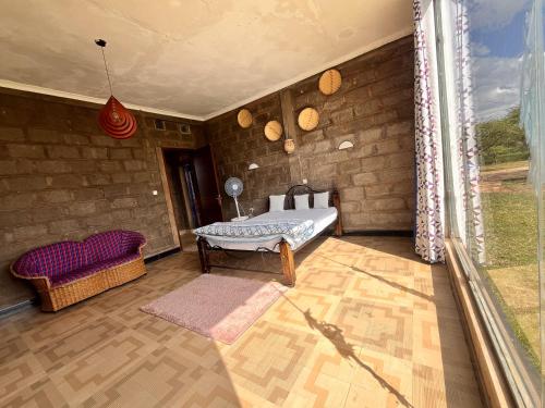 Gallery image of Amboseli Glass house in Oloitokitok 