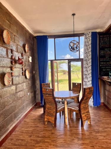 Gallery image of Amboseli Glass house in Oloitokitok 
