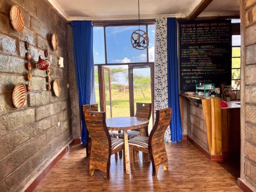 Gallery image of Amboseli Glass house in Oloitokitok 