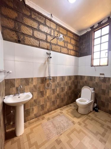 Gallery image of Amboseli Glass house in Oloitokitok 