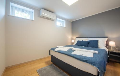 Ένα ή περισσότερα κρεβάτια σε δωμάτιο στο Stunning Apartment In Mrljane With Wifi