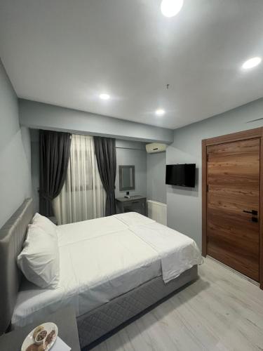 เตียงในห้องที่ Seaway Hotel İstanbul
