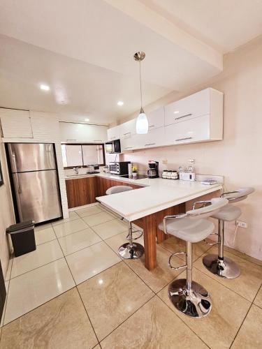 Kuchyň nebo kuchyňský kout v ubytování Apartamento SamSay I