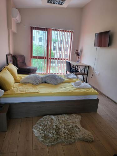 En eller flere senge i et værelse på Veliko Tarnovo central apartament