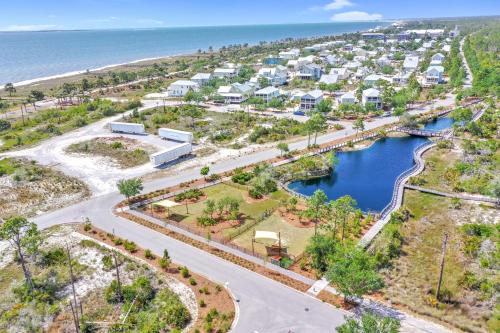 an aerial view of a resort next to the ocean at Embreeze Beach Casa by Pristine Properties Vacation Rentals in Highland View