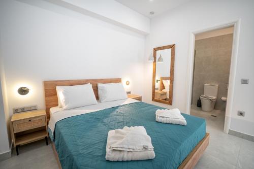 Ένα ή περισσότερα κρεβάτια σε δωμάτιο στο apartment kaminaki beach