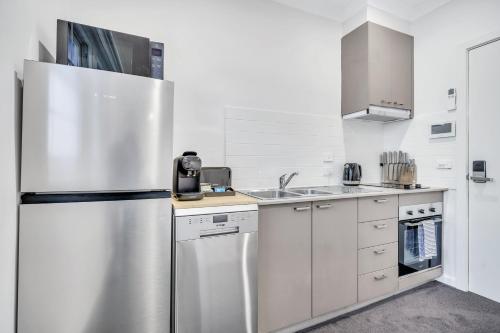 Η κουζίνα ή μικρή κουζίνα στο Grosvenor 3121 Richmond