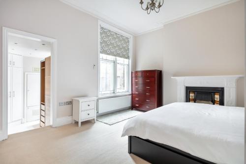 Posteľ alebo postele v izbe v ubytovaní Stylish flat in Hampstead