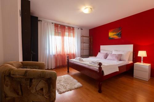 Una cama o camas en una habitación de Apartmani Čalane
