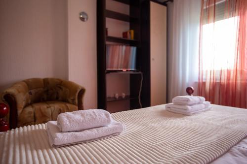 Una cama o camas en una habitación de Apartmani Čalane