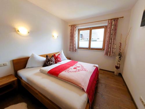 Postel nebo postele na pokoji v ubytování Appartement "Alpking"