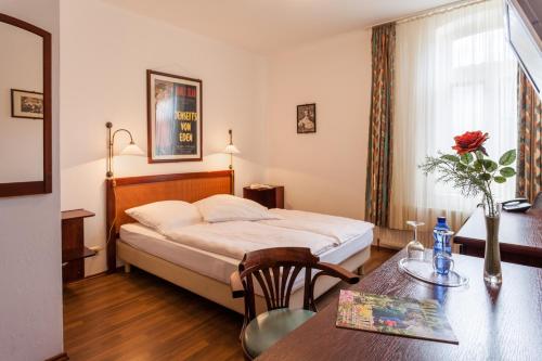 מיטה או מיטות בחדר ב-Landhotel Zur Linde