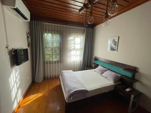 מיטה או מיטות בחדר ב-Stone House in Antalya