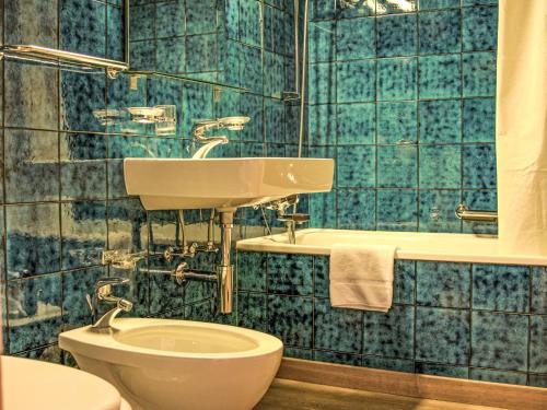 Un baño de Apartment Chesa Tschierv II 30 by Interhome