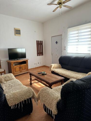 TV a/nebo společenská místnost v ubytování Bar Apartment