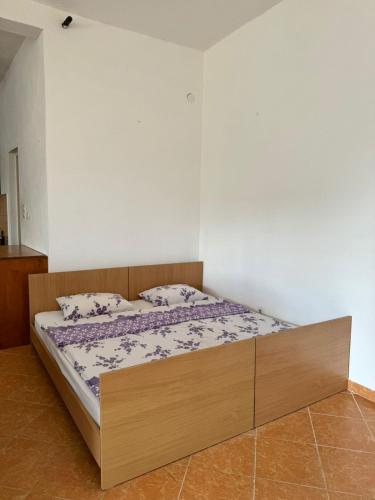 Postel nebo postele na pokoji v ubytování Bar Apartment