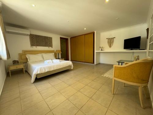 Ένα ή περισσότερα κρεβάτια σε δωμάτιο στο Happy Silva Guesthouse