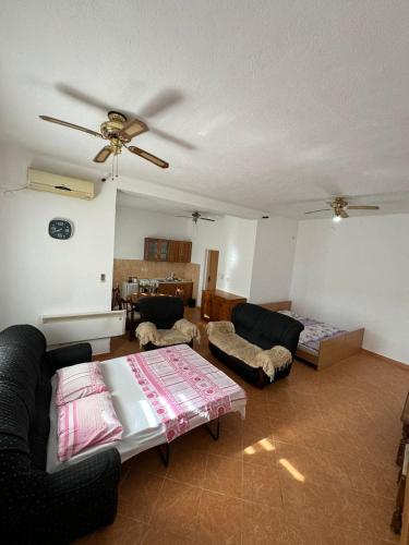 Postel nebo postele na pokoji v ubytování Bar Apartment