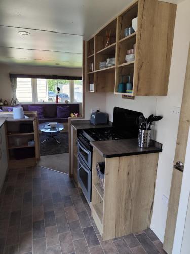 Kuchyň nebo kuchyňský kout v ubytování G & M Static Caravan Edinburgh